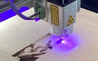 VIDEO: Laser Engraving with simCNC and CSMIO/IP vs Opt Lasers